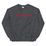 Dark grey unisex sweatshirt with phrase "Wind & Waves" written horizontally in red IM Fell font .