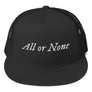 All Black Trucker Cap with "All or None" written horizontally across the front. Lettering is in white.