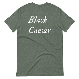 Grey unisex t-shirt with "Black Caesar" written in White, on two horizontal lines across the front. Black Caesar (died 1718) was a legendary 18th-century African pirate. The legends say that for nearly a decade, he raided shipping from the Florida Keys and later served as one of Captain Blackbeard's, a.k.a. Edward Teach's, crewmen aboard the Queen Anne's Revenge