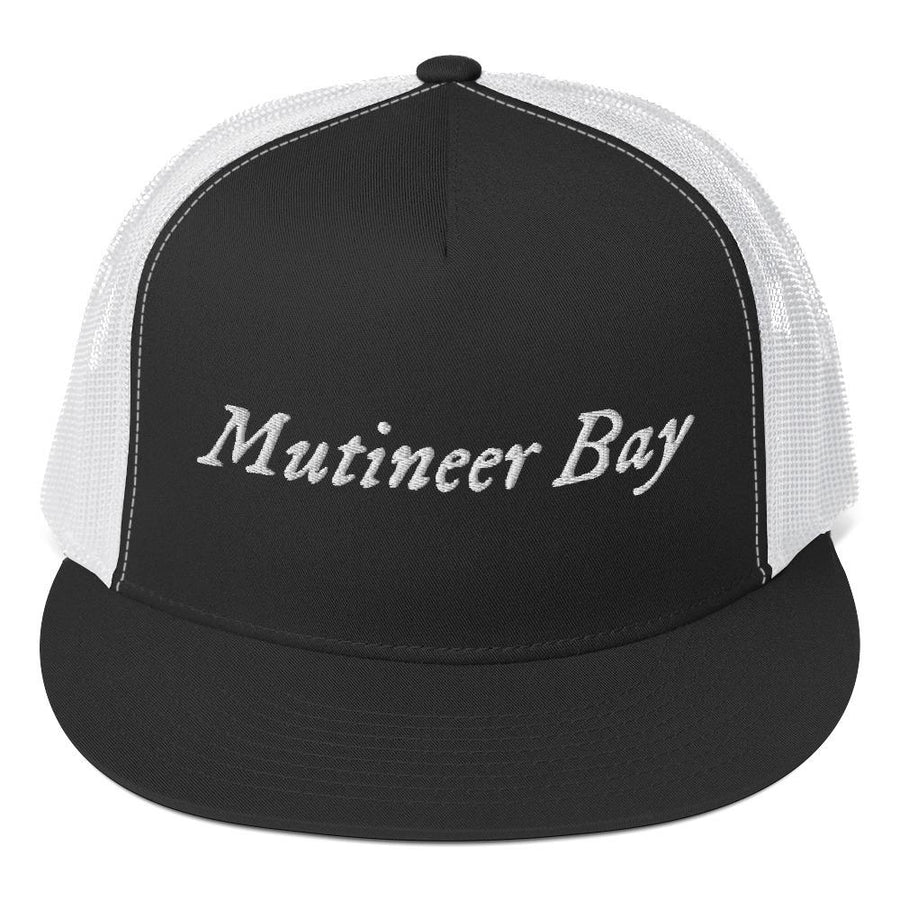 Stylish trucker cap with the phrase "Mutineer Bay" written horizontally in IM Fell font on the front of cap. Cap brim is black, front of cap is black, sides of cap are white. All lettering is in White.