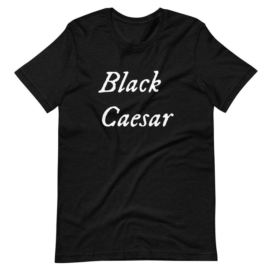 Black unisex t-shirt with "Black Caesar" written in White, on two horizontal lines across the front. Black Caesar (died 1718) was a legendary 18th-century African pirate. The legends say that for nearly a decade, he raided shipping from the Florida Keys and later served as one of Captain Blackbeard's, a.k.a. Edward Teach's, crewmen aboard the Queen Anne's Revenge