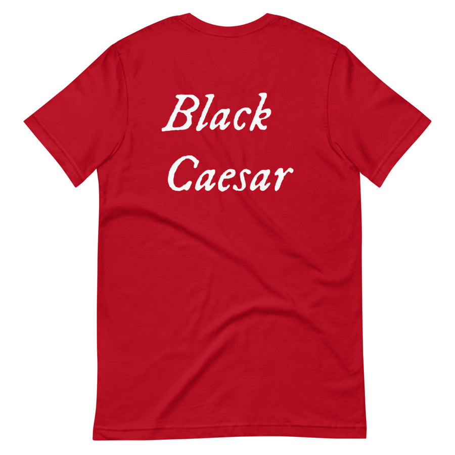 Red unisex t-shirt with "Black Caesar" written in White, on two horizontal lines across the front. Black Caesar (died 1718) was a legendary 18th-century African pirate. The legends say that for nearly a decade, he raided shipping from the Florida Keys and later served as one of Captain Blackbeard's, a.k.a. Edward Teach's, crewmen aboard the Queen Anne's Revenge
