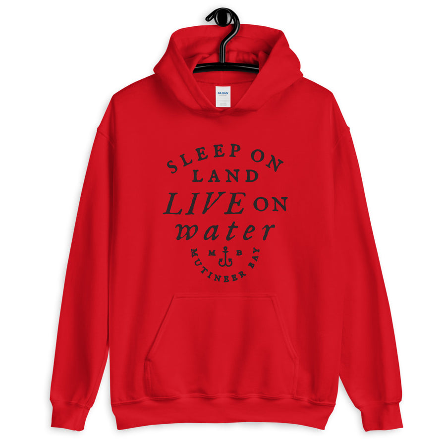 Red unisex hoodie with wording "Sleep on Land, Live on Water" written in black artistic lettering on front. Underneath this is very small semi circle stating "Mutineer Bay" centered with small anchor.