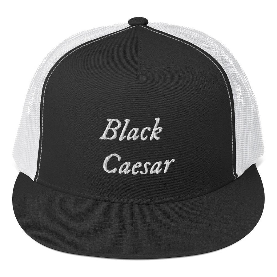 Black trucker cap with "Black Caesar" written horizontally, on two lines, on the front and back in white lettering. Brim is black and back of hat is white. Black Caesar (died 1718) was a legendary 18th-century African pirate. The legends say that for nearly a decade, he raided shipping from the Florida Keys and later served as one of Captain Blackbeard's, a.k.a. Edward Teach's, crewmen aboard the Queen Anne's Revenge