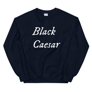 Black sweatshirt with "Black Caesar" written in White, on two horizontal lines across the front. Black Caesar (died 1718) was a legendary 18th-century African pirate. The legends say that for nearly a decade, he raided shipping from the Florida Keys and later served as one of Captain Blackbeard's, a.k.a. Edward Teach's, crewmen aboard the Queen Anne's Revenge