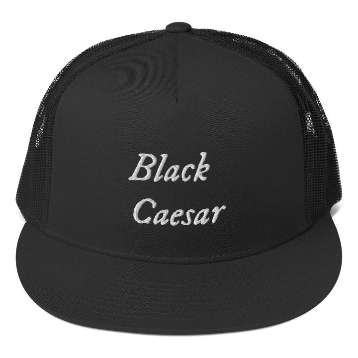 Black trucker cap with "Black Caesar" written horizontally, on two lines, on the front and back in white lettering. Black Caesar (died 1718) was a legendary 18th-century African pirate. The legends say that for nearly a decade, he raided shipping from the Florida Keys and later served as one of Captain Blackbeard's, a.k.a. Edward Teach's, crewmen aboard the Queen Anne's Revenge