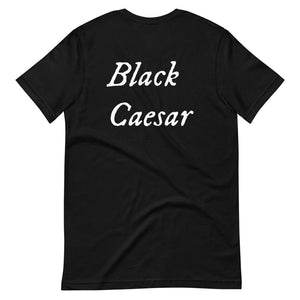 Black unisex t-shirt with "Black Caesar" written in White, on two horizontal lines across the front. Black Caesar (died 1718) was a legendary 18th-century African pirate. The legends say that for nearly a decade, he raided shipping from the Florida Keys and later served as one of Captain Blackbeard's, a.k.a. Edward Teach's, crewmen aboard the Queen Anne's Revenge